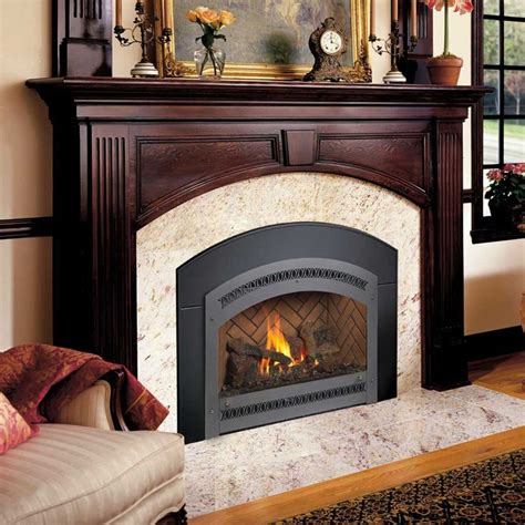 Fireplace xtrordinair - 564 TRV 25K. This top or rear vent (TRV) model has 564 square inches of glass and is perfect for family rooms. This Deluxe fireplace offers new features such as adjustable overhead Accent Lights, Ember-Glo™ ember bed lighting and the optional CoolSmart TV Wall™. 25,000 BTUs. 564 TRV 25K Clean Face. 